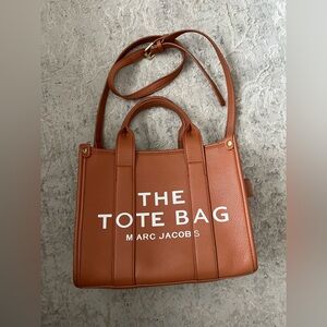 Marc Jacobs inspired Tan Tote with White Text in excellent condition w/ strap